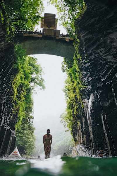 Aidan Heslop of the UK dives from the 27 metre platform during the final competition day of the fourth stop of the Red Bull Cliff Diving World Series in Takachiho, Japan on August 3, 2023.