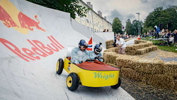Red Bull Soapbox Race participants race downhill in homemade soapbox vehicles in Oslo, Norway in 2023