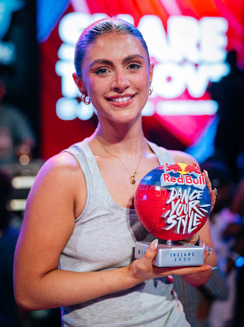 Demi Morann celebrates her victory with the Red Bull Dance Your Style trophy after the 2026 National Final in Dublin, Ireland, on 18 July 2026