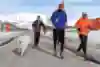 Participants perform during the Wings for Life World Run in App Run in Spitzbergen, Norway on May 7, 2017