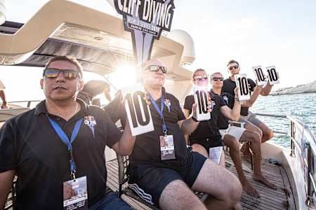 The judges score 10s across the board for Gary Hunt of the UK for his final dive at the fifth stop of the Red Bull Cliff Diving World Series in Beirut, Lebanon on July 14, 2019.