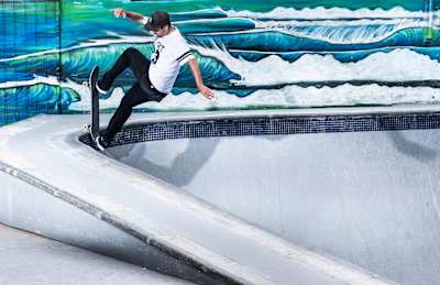 Local ripper Caique Silva performs a Frontside Blunt at the Konig bowl skate spot in Florianopolis, Brazil