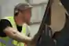 Sebastian Keep helps out the project staff with the ramp for his Walls project in Hastings, England