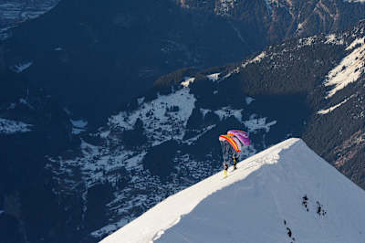 Speedriders Valentin Delluc and Martin Schricke prepare to take off at Silberhorn, Switzerland