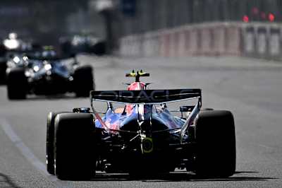 A Formula One single-seater uses Overtake and Boost to pass its rivals on the racetrack.