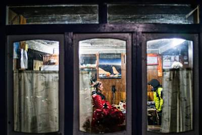 Ryan Sandes and Ryno Griesel sat inside a hut during Great Himalaya Trail.