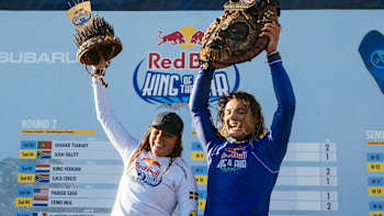 Nathalie Lambrecht and Lorenzo Casati celebrate on the podium during Day 3 of Red Bull King Of The Air 2025 in Cape Town, South Africa, proudly lifting their unique event trophies