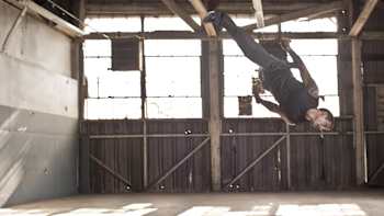 Stunt actor Remi Bakkar in mid-flip