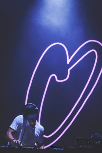 Melvo Baptiste behind the decks at Glitterbox