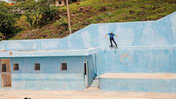 Jaws grinds a rooftop ledge to a huge drop in Cape Verde.