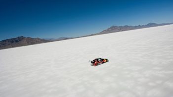 A photo of Brazil's Cacá Bueno racing his stock car across the Bonneville Salt Flats in Utah, USA.