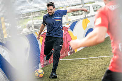 FIFA esports star, Msdossary, takes a shot on goal.