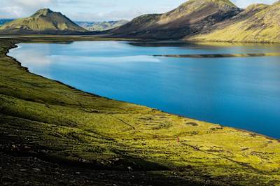 Riding beside Lake Alftavatn