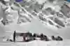 Corralling up with tents and snowmobiles