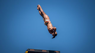 Catalin Preda of Romania dives from the 27m platform during the final competition day of the first stop of the Red Bull Cliff Diving World Series in Saint Raphael, France on June 12, 2021.