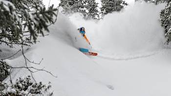 Freeskier Paddy Graham demonstrates a powder turn.