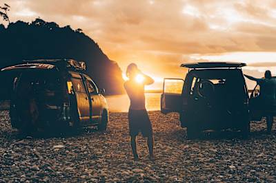 Beach sunset with the camper van, New Zealand.