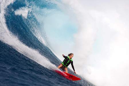 Paige Alms running and gunning on a Jaws beast