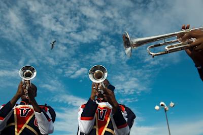 A photo of Virginia State University's Trojan Explosion Marching Band performing at Norfolk State University in 2012.