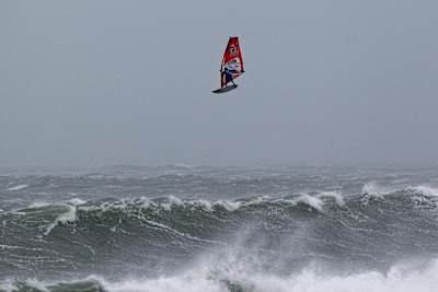 Windsurfer Dany Bruch soars high above the surf in Brandon Bay in Ireland during Mission 1 of Red Bull Storm Chase.