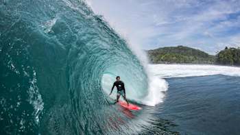 Mikala Jones grew up in front of one of the world's busiest photo studio waves. These days he prefers to drag his own shooters to the most remote locations he can dig up.