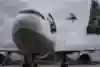 Jason Paul leaps into a plane