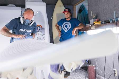 Keith Taboul and Levi Siver are seen working on a windsurfing powder board at Rishiri Island in Hokkaido, Japan on December 28, 2016