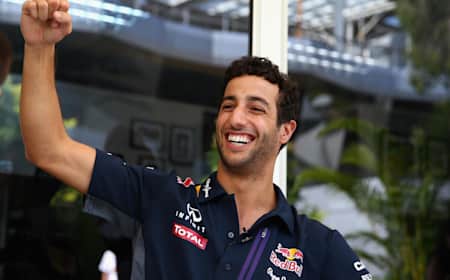 Daniel Ricciardo pumps his fist in air