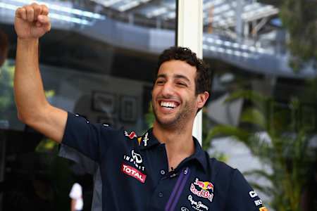 Daniel Ricciardo pumps his fist in air