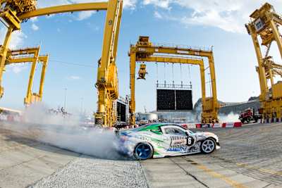 Competitor performs, Oman, 2016