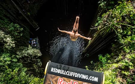 Adriana Jimenez of Mexico dives from the 20m platform during the  final stop of the Red Bull Cliff Diving World Series, Ik Kil cenote, Yucatan, Mexico, on October 17, 2014.