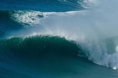 Surfer Fred David pulls into a barrel at big Nazare