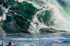 Surfer Mick Fanning rides a giant wave at Shipstern Bluff in Tasmania