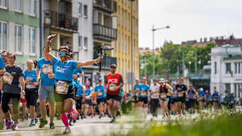Participants perform during the Wings for Life World Run Flagship Run in Vienna, Austria, on May 7, 2023.