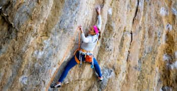 Sasha DiGiulian of the United States climbs a rock face in Kalymnos, Greece, on October 25, 2021.