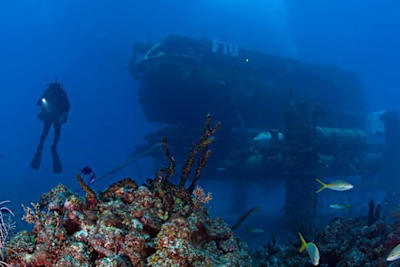 Cousteau in front of the Aquarius Habitat