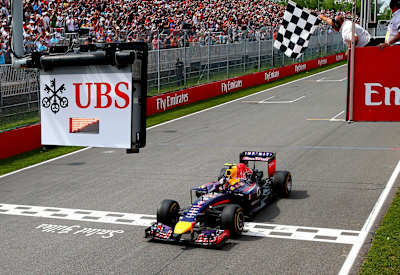 Ricciardo crossing the line in Canada 2014.