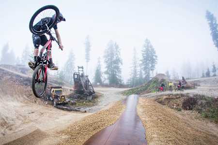 Matty Miles working on style at Coast Gravity Bike Park