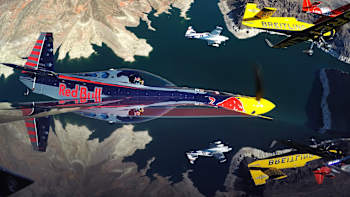 Red Bull Air Race pilots Pete McLeod, Nigel Lamb, Martin Sonka and Kirby Chambliss fly above Nevada on October 9, 2014.