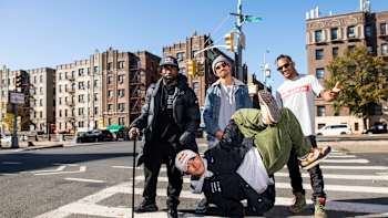 Breakers, including Alien Ness and Grandmaster Caz, pose on a crosswalk in New York City during filming for Breaking Beyond, a show about breaking and hip-hop on Red Bull TV.