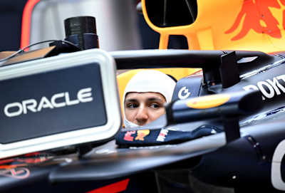 Isack Hadjar of France and Oracle Red Bull Racing prepares to drive in the garage during F1 Testing at Yas Marina Circuit on December 09, 2025 in Abu Dhabi,
