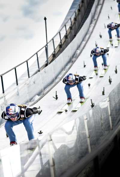 Adam Malysz performs a ski jump in Innsbruck, Germany in 2010 
