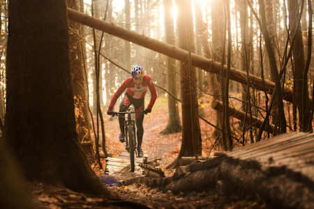 Simon Andreassen riding a trail in Denmark