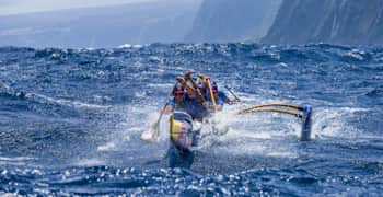 The Red Bull Wa'a outrigger canoe paddling team in action in Hawaii.