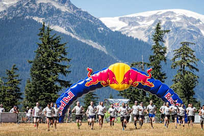 Competitors burst out of the start gate
