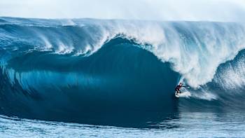 Surfer Kerby Brown rides a huge tube at The Right in Western Australia.
