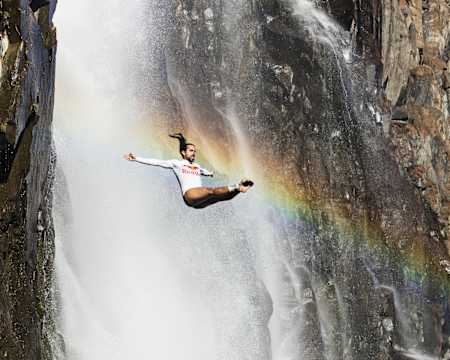 Cliff diver Orlando Duque dives from 30 metres at Victoria Falls, Zambia. 