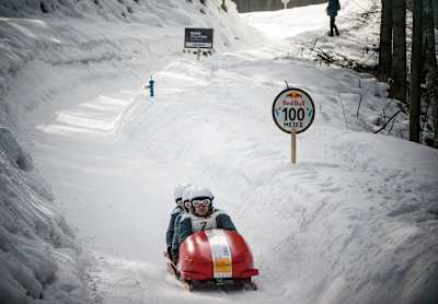 Competitors perform at the Red Bull Bob Heroes in Garmisch-Partenkirchen, Germany on February 15, 2015.