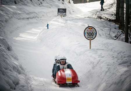 Competitors perform at the Red Bull Bob Heroes in Garmisch-Partenkirchen, Germany on February 15, 2015.