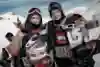 Sebastien Toutant and Mark McMorris pose with their full snowboarding gear on the slopes of Tignes during the X Games.
